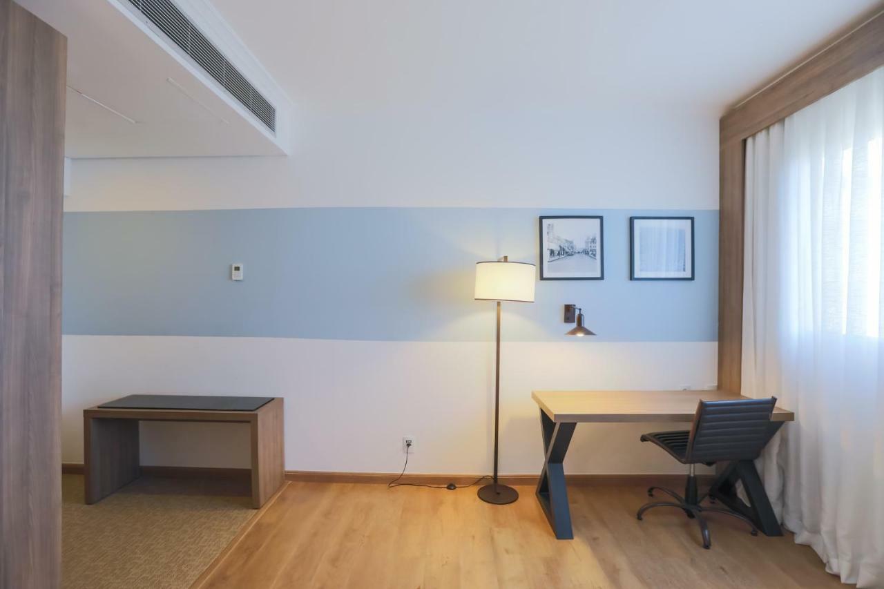 ทริป บาย วินด์แฮม ริเบเรา เปรโต Hotel ฮิเบเราเปรโต ภายนอก รูปภาพ A room at the hotel